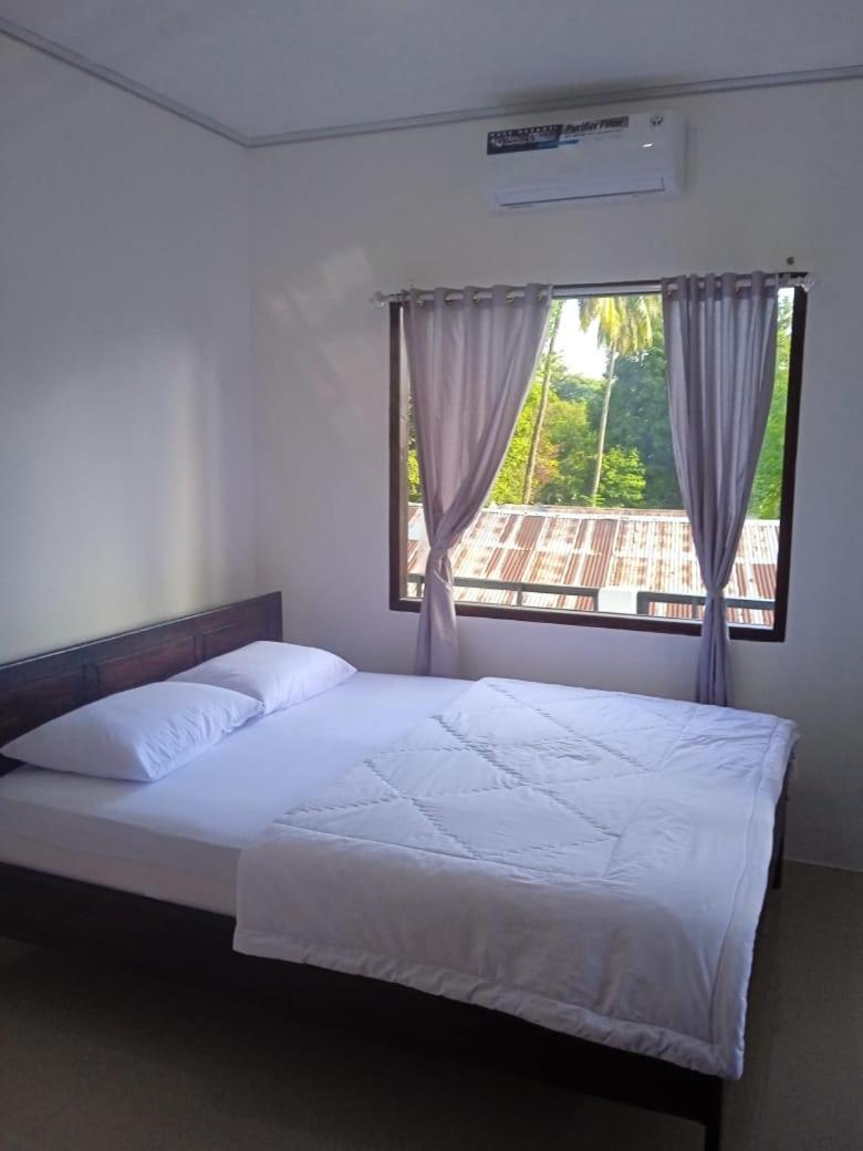Riung Tiga Empat Tujuh Guesthouse Buitenkant foto